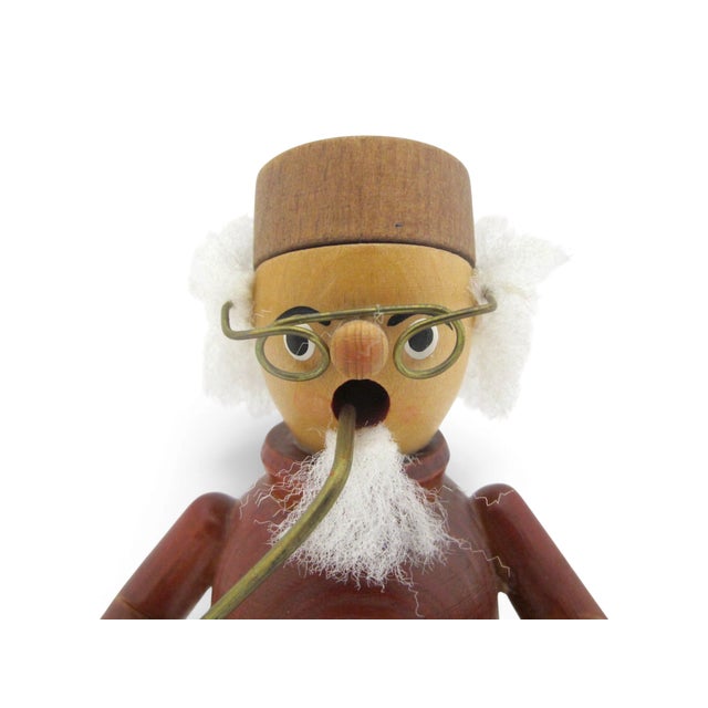 Traditional German wooden incense smoker depicting a schoolmaster made by Richard Glässer GmbH from Kurort Seiffen in the...