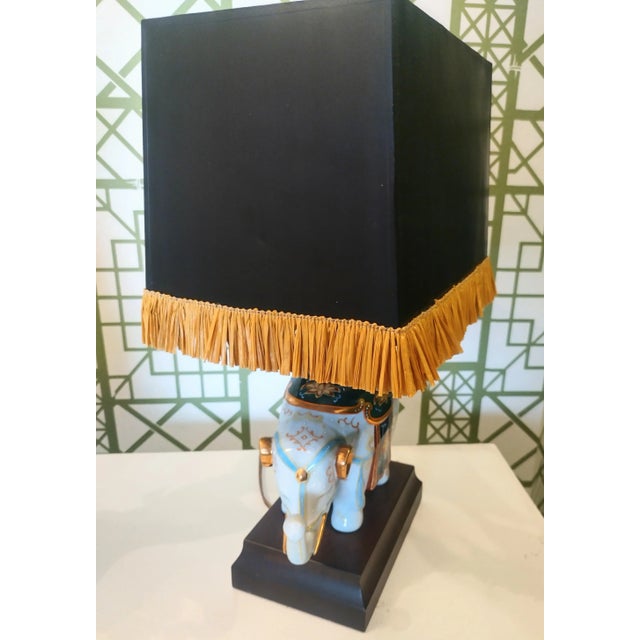 A pretty small vintage elephant lamp by Frederick Cooper. This is such a great piece and it still has the Frederick Cooper...