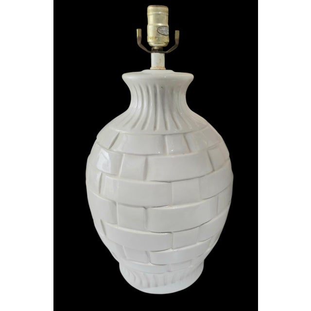 A beautiful large pair of vintage porcelain lattice design white table lamps. The lamps are nice and big and have a pretty...