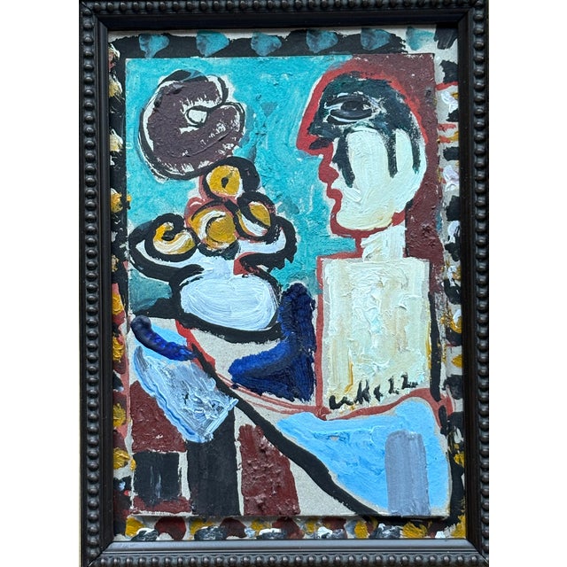 An unusually small Hannam piece in a great big frame. The strong use of color and line are suggestive of Picasso, as are...