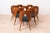 This set of eight vintage dining chairs was designed by czech designer antonin šuman in the 1960s. The chairs have been...