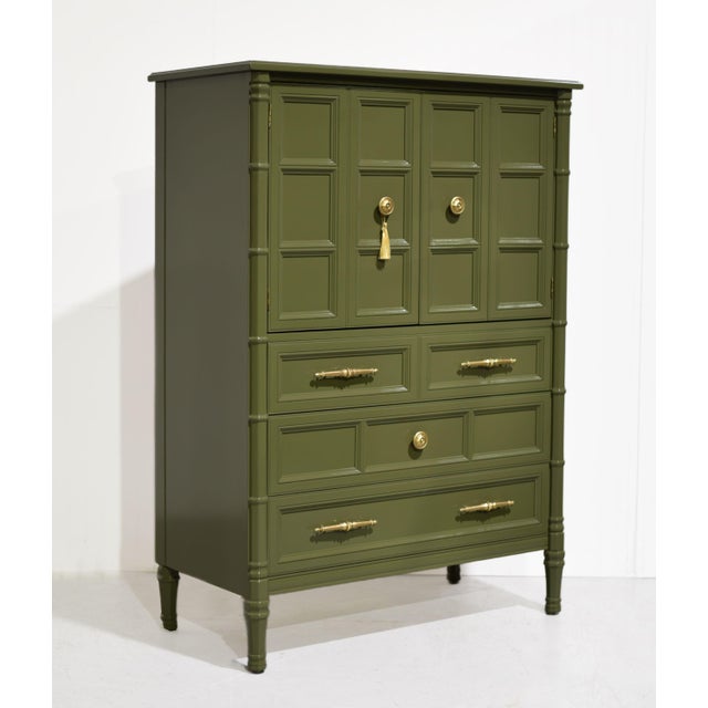 This nine-drawer highboy by Henredon is newly painted in a deep, warm green — a smooth, hand-applied finish that reads...
