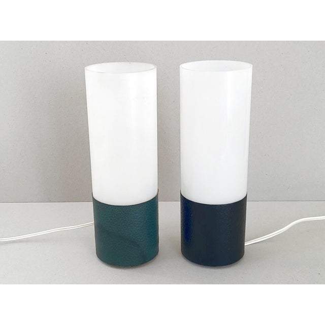 In fair condition, with normal signs of wear and scratches. Both are functional. The green base lamp has a switch and...