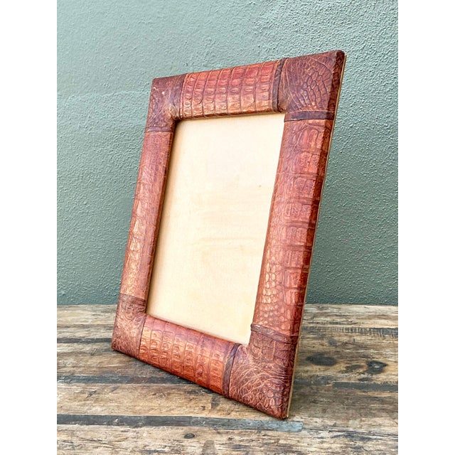This exceptional vintage picture frame is a rare piece of Cuban artisanal history, masterfully wrapped in genuine, high-...