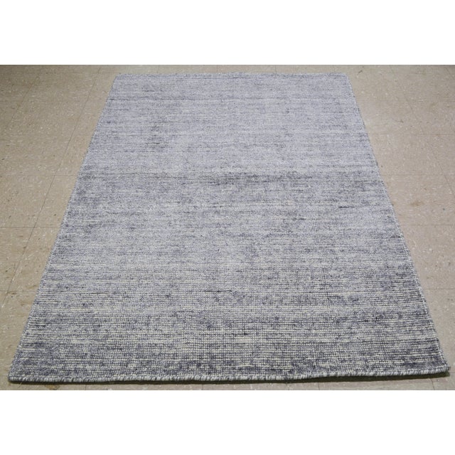 Made using traditional rug making techniques, this wool/bamboo rug blends timeless craftsmanship with a modern approach to...