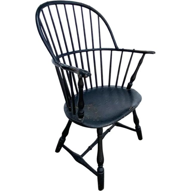 DETAILS An antique American painted sackback knuckled arm chair. COLOR(S) Black PLACE OF ORIGIN United States PERIOD Mid...