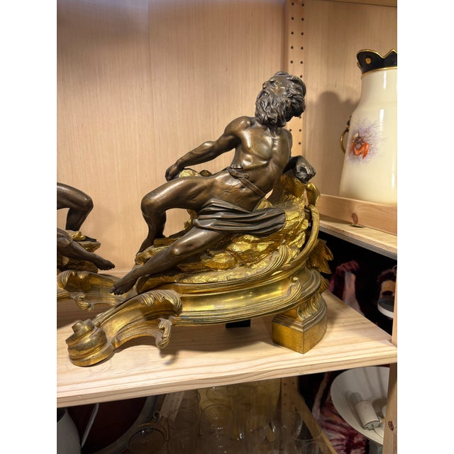 Pair of Louis XV, In the form of river gods, raised on wave and rock bases. Extremely well detailed completed in Bronze.