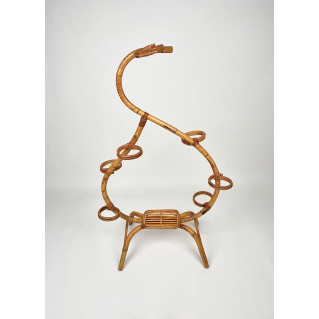 Plant and flower holder (seven places) in rattan and bamboo. Made in Italy in the 1960s.