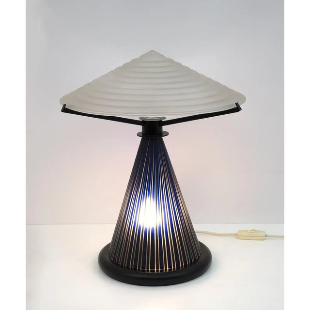 Table lamp produced in Murano by Murano Masters, conical base in blown glass with colored rods, acidic white glass hat....