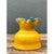 This studio pottery vase makes an immediate visual impact through its bold color pairing and expressive silhouette. The...