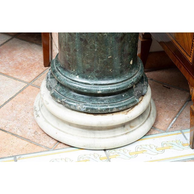 Antique Neapolitan Empire column in scagliola resting on a white marble base, dating back to the early 19th century....