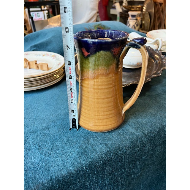 Up for consideration is a beautiful vintage yellow pottery pitcher. This would look lovely in your home and it is a great...