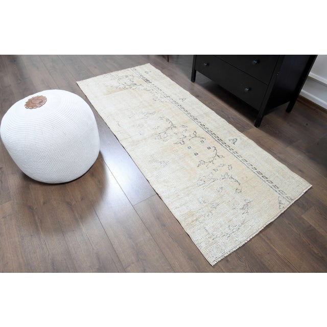 Vintage Persian Hand-Knotted Runner rug is a semi-antique vintage Runner rug. The '70s Eastern region of Anatolian's...