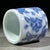 A charming Chinese blue and white porcelain thumb ring (ban zhi). Originally used for archery to protect the thumb, these...