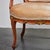 A hand carved, hand painted and gilded Venetian armchair. Modern velvet upholstery and trim. Upholstered arm pads. (note:...