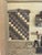 An original handcrafted wood marquetry diorama titled "Grandma's Passion," signed by Cleve Lewis and dated April 1994....