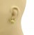 This is a lovely authentic pair of earrings from designer Elizabeth Rand, crafted from 18k yellow gold with a matte finish...