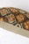 A bolster size rug pillow from an antique persian kurd rug 11'' x 20''