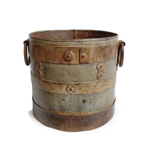 Vintage India iron bucket. Interesting aged patina with iron details and iron ring handles. Each have unique signs of age...