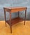 Charming English side table in the Jacobean Revival style, dating from the 20th century. The table features a rectangular...