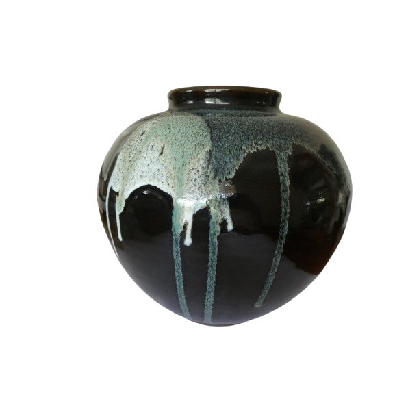 Large vintage Japanese vase. The size commands attention. The white overglaze brings out hues of blue and green over the...