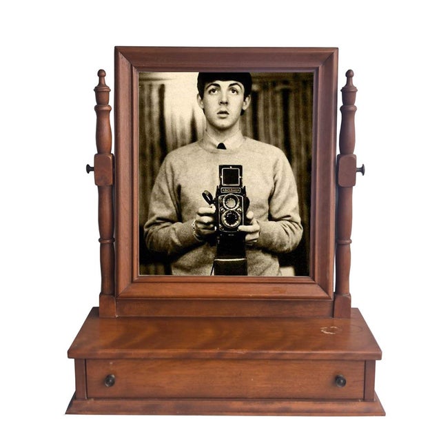 Offered is a 1960s Ethan Allen Baumritter cheval / vanity / shaving maple wood swivel mirror with a drawer base. The...