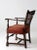 This is an antique Louis XII style armchair. The wooden accent chair features a caned back with upholstered seat, claw...