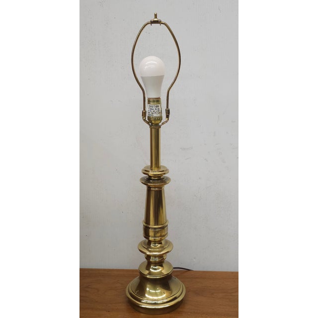 Stiffel Mid-Century Polished Solid Brass Colunm Table Lamp Measures 6" in width, 6" in depth and 21" in height to the top...