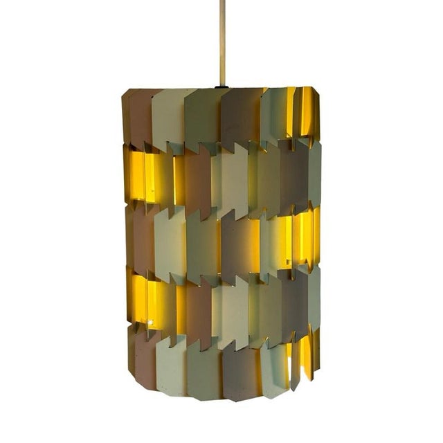 Vintage, Danish made hanging pedant. Made from thee different colored metal plates that interlock having some narrow gaps...