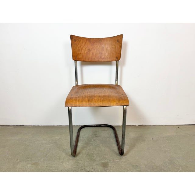 Vintage industrial chair made in former Czechoslovakia during the 1960s. The construction is made of chrome plated iron...