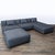 This Maiden Home sectional offers a stylish and spacious seating solution for any living room. The modern dark gray...