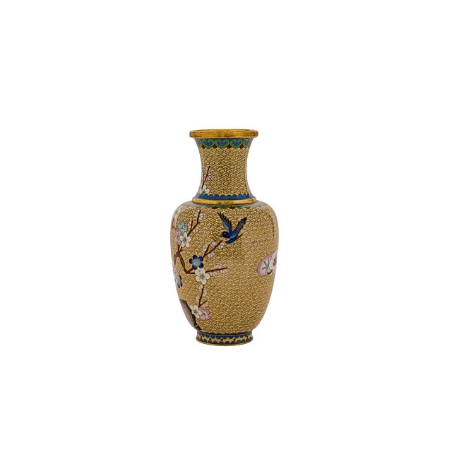 Vintage Chinese Cloisonné Brass Enamel Vase featuring floral motifs of cherry or plum blossoms against a patterned...