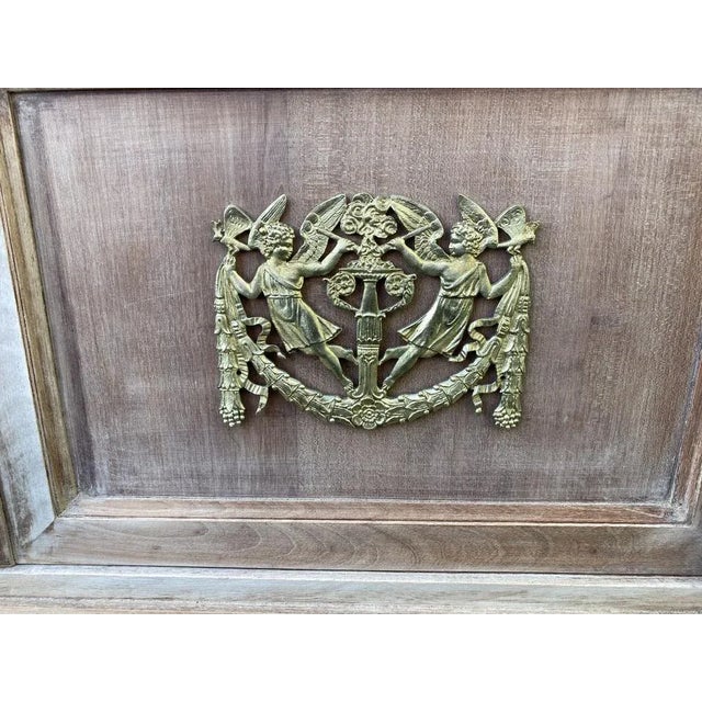 A great looking French Empire Cabinet of Egyptian Revival Style. Made from Mahogany which we have bleached and having...