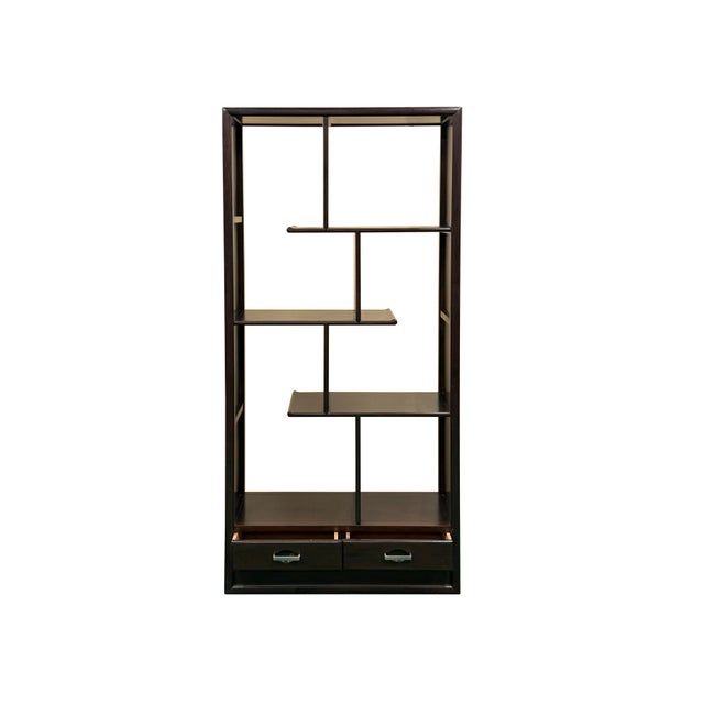 Elevate your living space with this striking Asian-inspired asymmetrical open shelving unit, a masterclass in balancing...