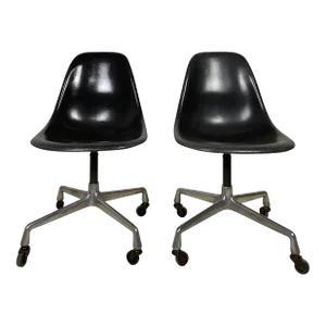 Mid 20th Century Vintage Charles and Ray Eames for Herman Miller Mid Century Fiberglass Wheeled Shell Chairs - a Pair