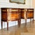 Exceptional pair of French Louis XVI style demilune commodes featuring richly figured mahogany veneers, dramatic marble...