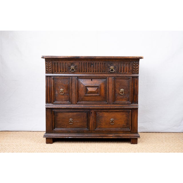 An oak chest or commode, early 20th century, English. Made in the style of late 17th century / Charles II period...
