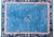 This early 20th-century Chinese Art Deco rug features a deep indigo field that draws you in immediately. Around it,...