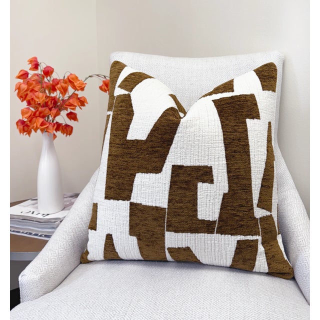 This cocoa and cream pillow cover blends bold pattern with a rich, textured finish. The deep cocoa brown design contrasts...