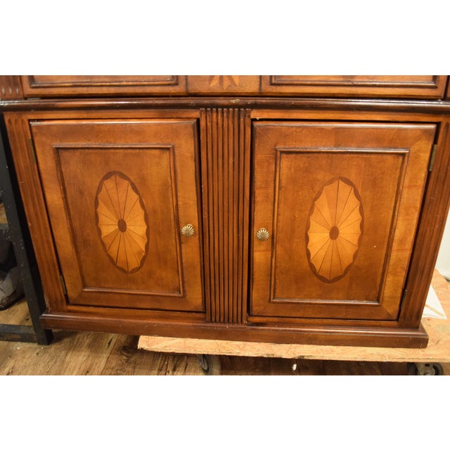 Up for sale is a beautiful traditional accent cabinet / server featuring rich wood tones and exquisite marquetry inlay...