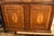 Up for sale is a beautiful traditional accent cabinet / server featuring rich wood tones and exquisite marquetry inlay...