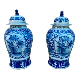Pair of Chinese Blue and White Jars With Lids