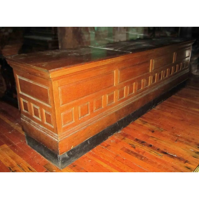Last quarter 19th century oak shop counter. Design features rectangular fielded panels over smaller square fielded panels,...