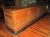 Last quarter 19th century oak shop counter. Design features rectangular fielded panels over smaller square fielded panels,...