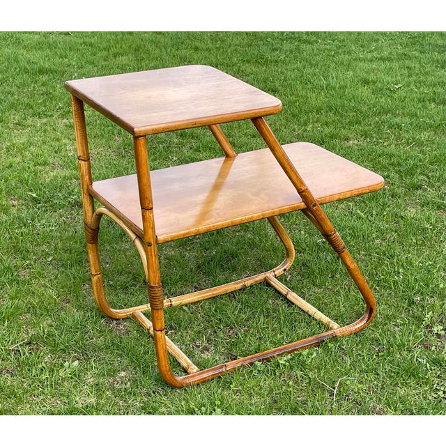 Beautiful restored 1950's Rattan Bentwood side table. Gorgeous color, sturdy construction and tight connections/wrapping.