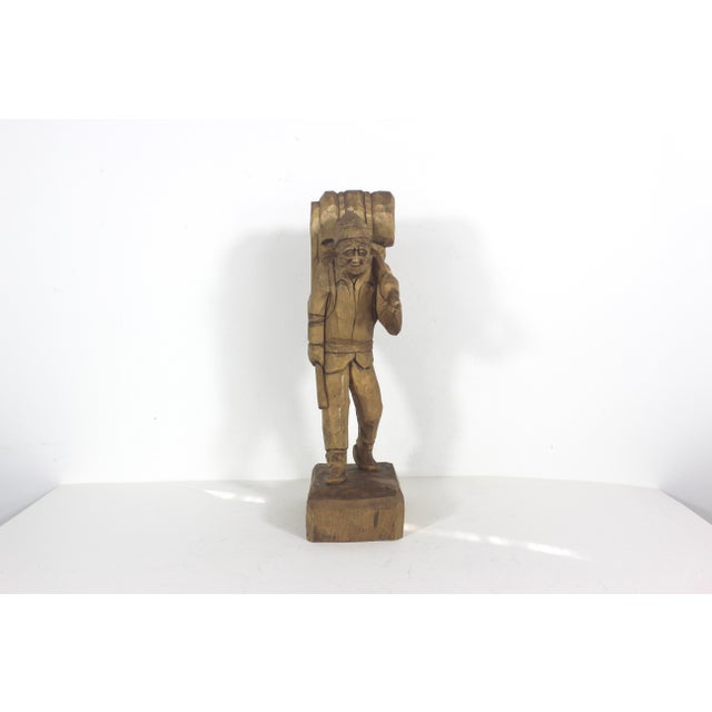 Vintage French Canadian Folk art carved hunter, trapper or winter traveller with a rifle, snowshoes, bedroll and a...