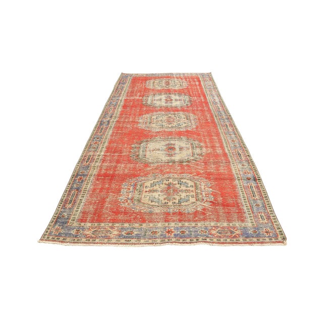 Handknotted vintage wool rug from Oushak region of Turkey. Approximatelly 50-60 years old. In very good condition.