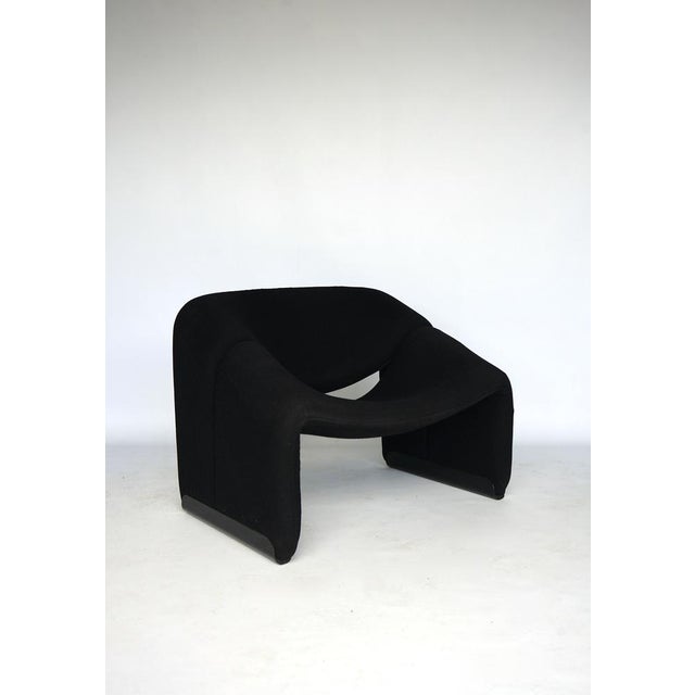 A classic 'M' Chair or Groovy chair designed by Pierre Paulin for Artifort in the 1960s and a chair that has always been...