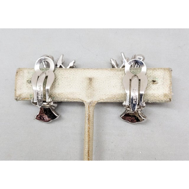 Silver Vintage 1950s Signed Pennino Rhodium Plated Clear Rhinestone Floral Spray Clip Earrings - 2 Pieces For Sale - Image 8 of 8