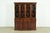 A gorgeous Georgian or Chippendale style breakfront bookcase or dining cabinet with drop front secretary desk In the...